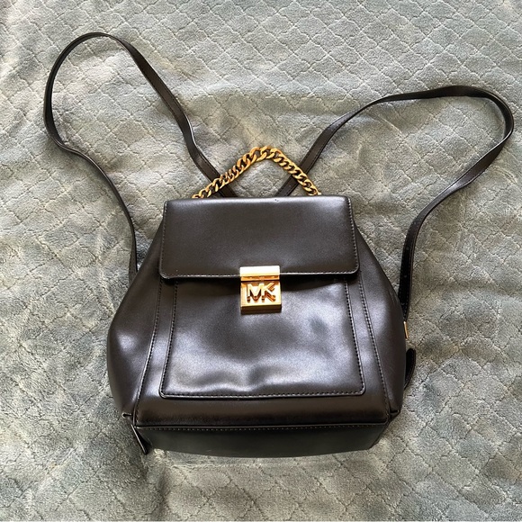 Michael Kors Handbags - Y2K Michael Kors Black and Gold Backpack with Adjustable‎ Straps genuine leather